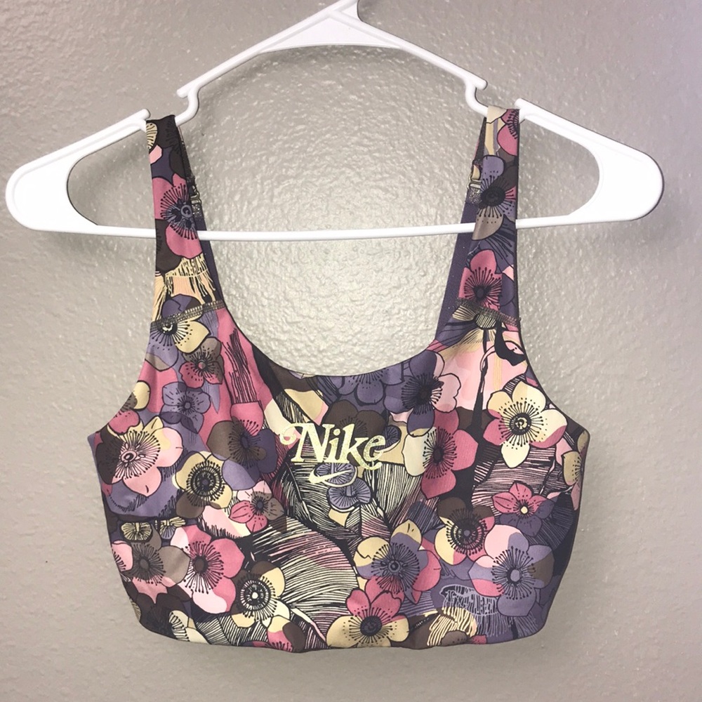 Brand is Nike, Size Medium and is multicolored with floral design